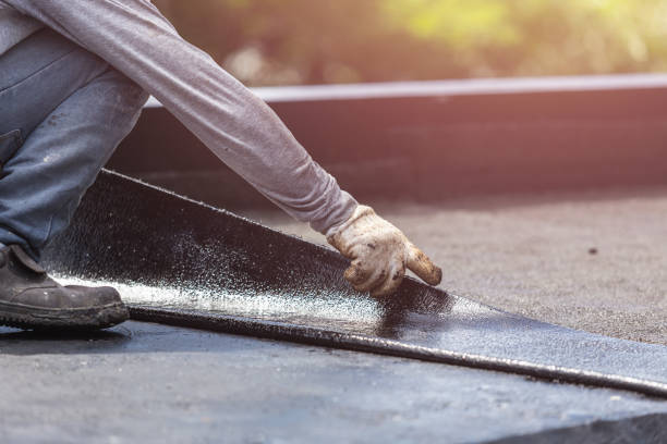 Professional Basement Waterproofing technician working in Mendon, IL